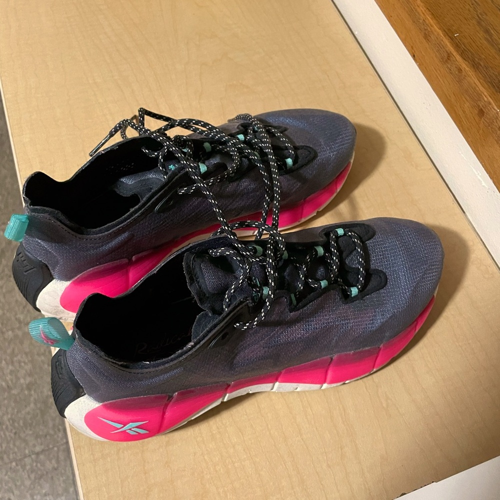 Black and pink Reeboks